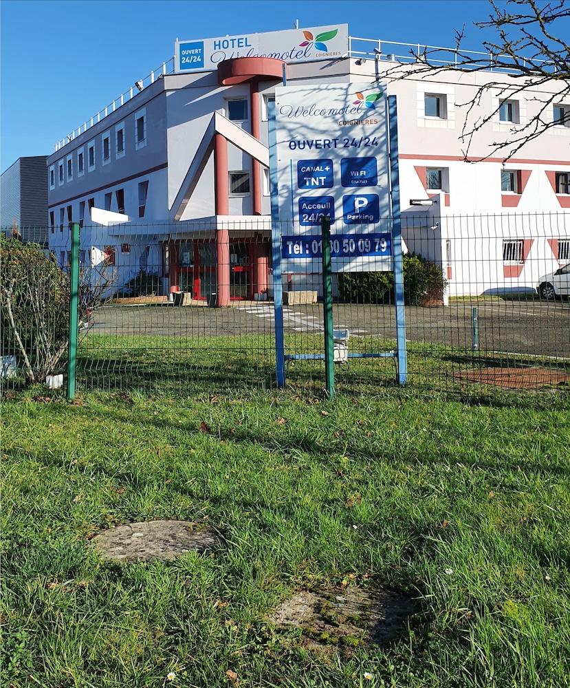 Welcomotel Coignieres Bagian luar foto