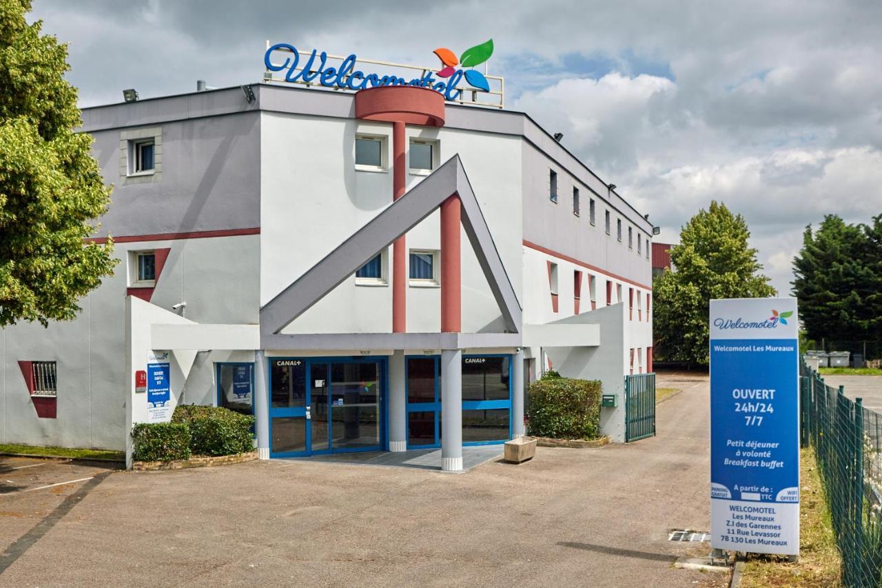 Welcomotel Coignieres Bagian luar foto