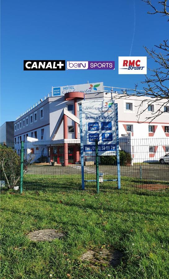 Welcomotel Coignieres Bagian luar foto
